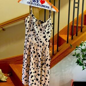 Bloomingdales aqua light pink dress with navy blue “spots.” Adjustable straps.